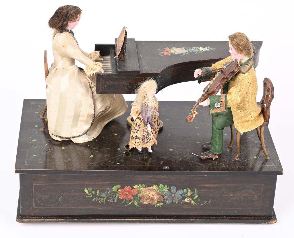 RZEBITSCHEK CLOCKWORK MUSICAL AUTOMATON: 19th Century Rzebitschek of Czechoslovakia Musical Automaton. Clockwork Woman playing Piano, Man playing Violin, and Child dancing. All wood and paper mache. Wonderful original condition with very nic