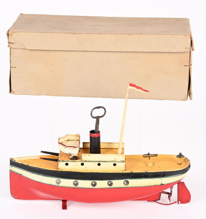 GERMAN TIN CLOCKWORK BATTLESHIP w/ BOX: German tin clockwork Battleship. All original with very nice paint. Still has mast with flag. Windup works. Comes with Box. 9 1/2" Excellent