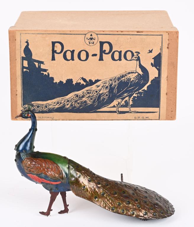 HANS EBERL TIN WINDUP PAO PAO PEACOCK w/ BOX: German Hand Eberl tin windup Pao Pao Peacock. All original with wonderful colors and details. Windup works. Comes with restored box that has original bot top with label. 9 1/2" Excellent