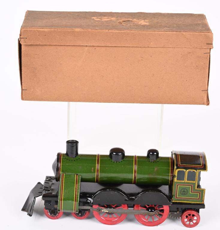 HANS EBERL TIN WINDUP EURO TRAIN LOCOMOTIVE w/BOX: Scarce German tin windup European Train Locomotive. All original with very nice details. Looks basically never played with condition. Windup works. Comes with Box. 9" Excellent