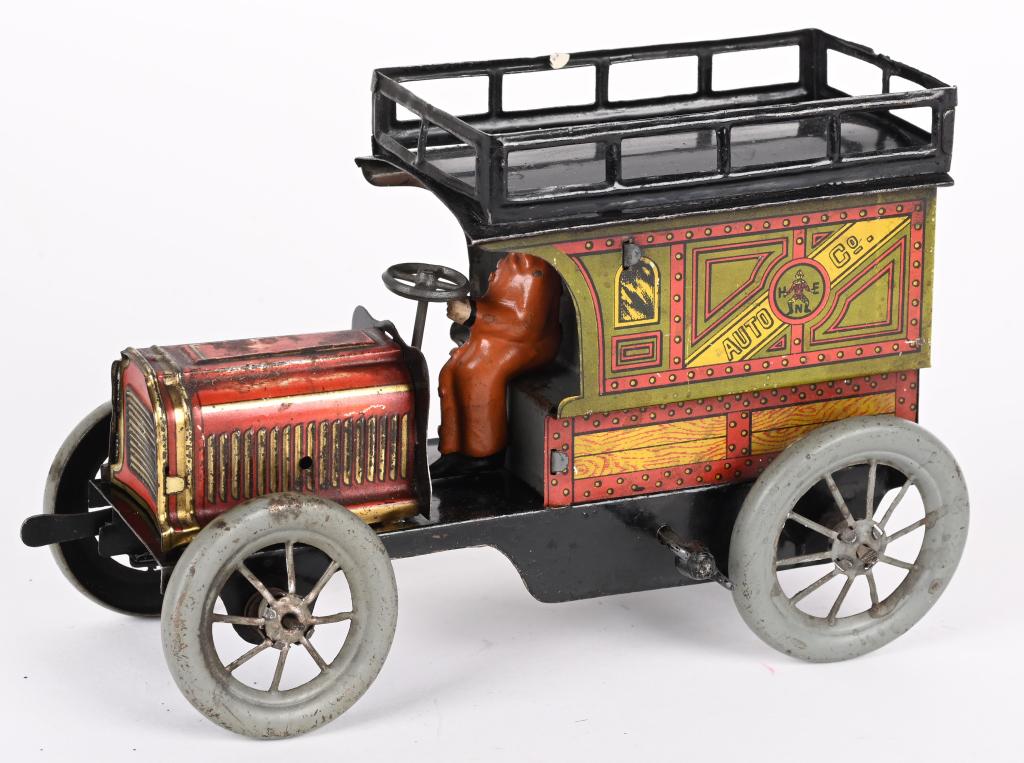 HANS EBERL TIN WINDUP AUTO CO. DELIVERY VAN: Scarce Hans Eberl tin windup Auto Co Delivery Van. Nice looking early Delivery Van. Windup works. Has some wear and replaced driver. 7" Very Good