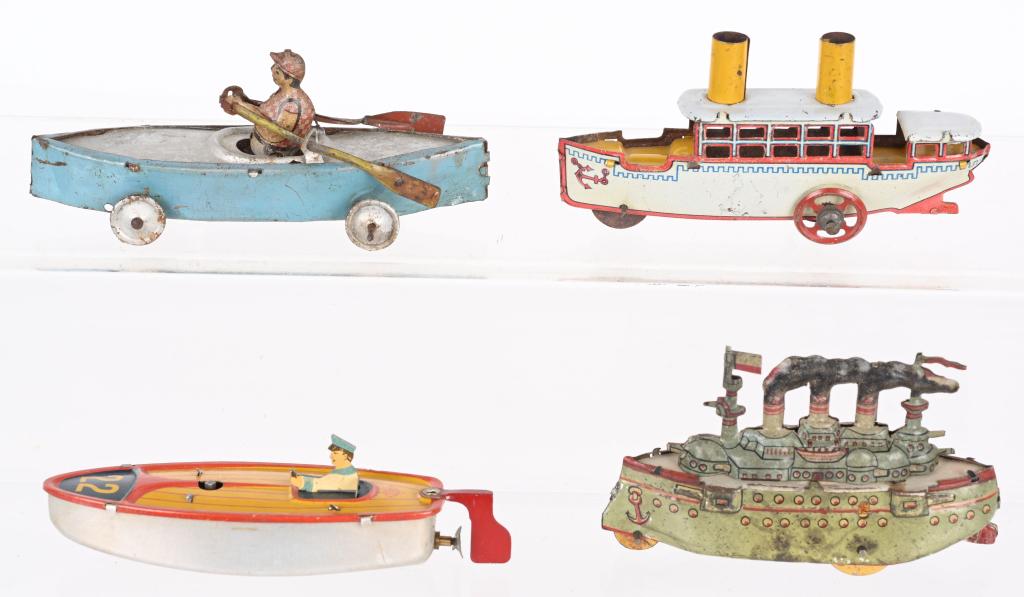 4- GERMAN PENNY TOY BOATS: Lot of 4 German Penny Toy Boats. All very nice looking. Largest 4" Excellent