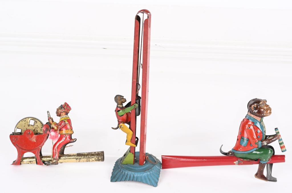 3- GERMAN MONKEY PENNY TOYS: Lot of 3 German Penny Toys. All different with great details. Largest 6 1/2" Excellent