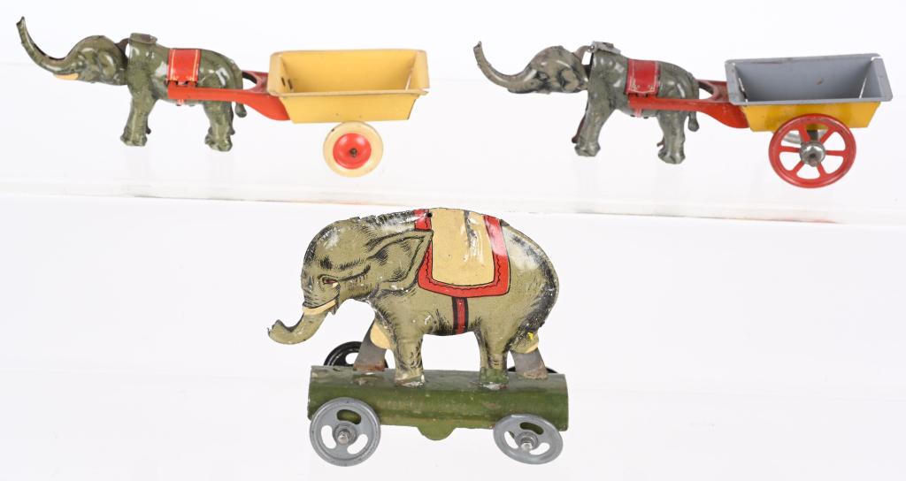 3- GERMAN ELEPHANT PENNY TOYS: Lot of 3 German Penny Toys. All different with great details. Largest 5" Excellent