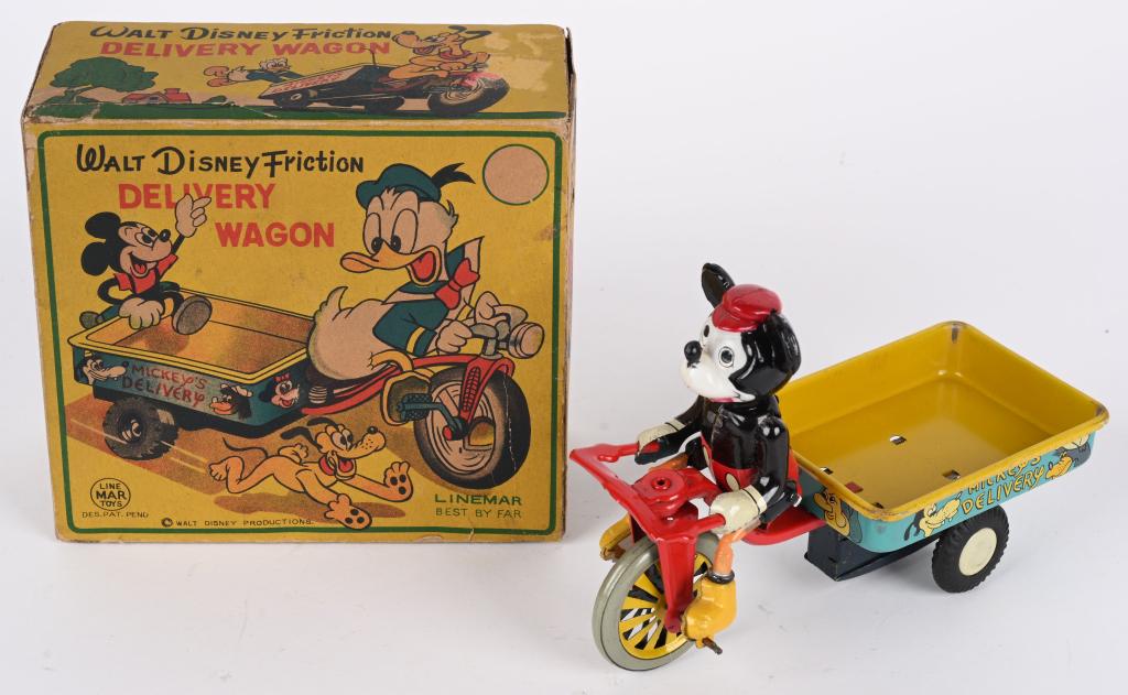 LINEMAR MICKEY MOUSE DELIVERY WAGON w/ BOX: Linemar tin and celluloid Mickey Mouse Delivery Wagon. All original and looks never played with condition. Great colors and Disney graphics. Friction works. Boxed 5 1/2" Excellent