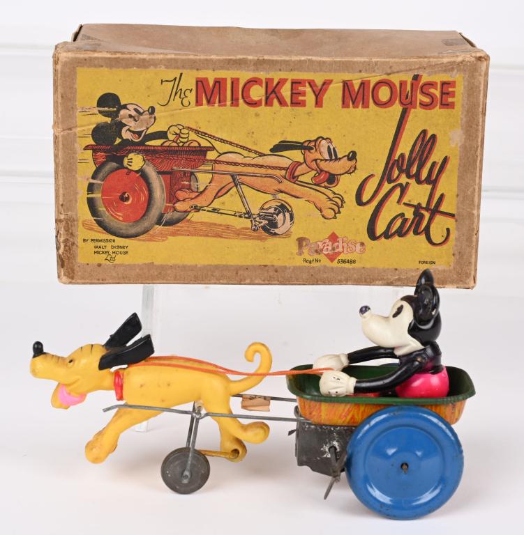 DISNEY MICKEY MOUSE JOLLY CART WINDUP w/ BOX: Rare 1930's Mickey Mouse toy made in Japan for the English market. Tin cart with celluloid Mickey Mouse inside being pulled by a celluloid Pluto. Retains the original paper inspection tag. The toy wor