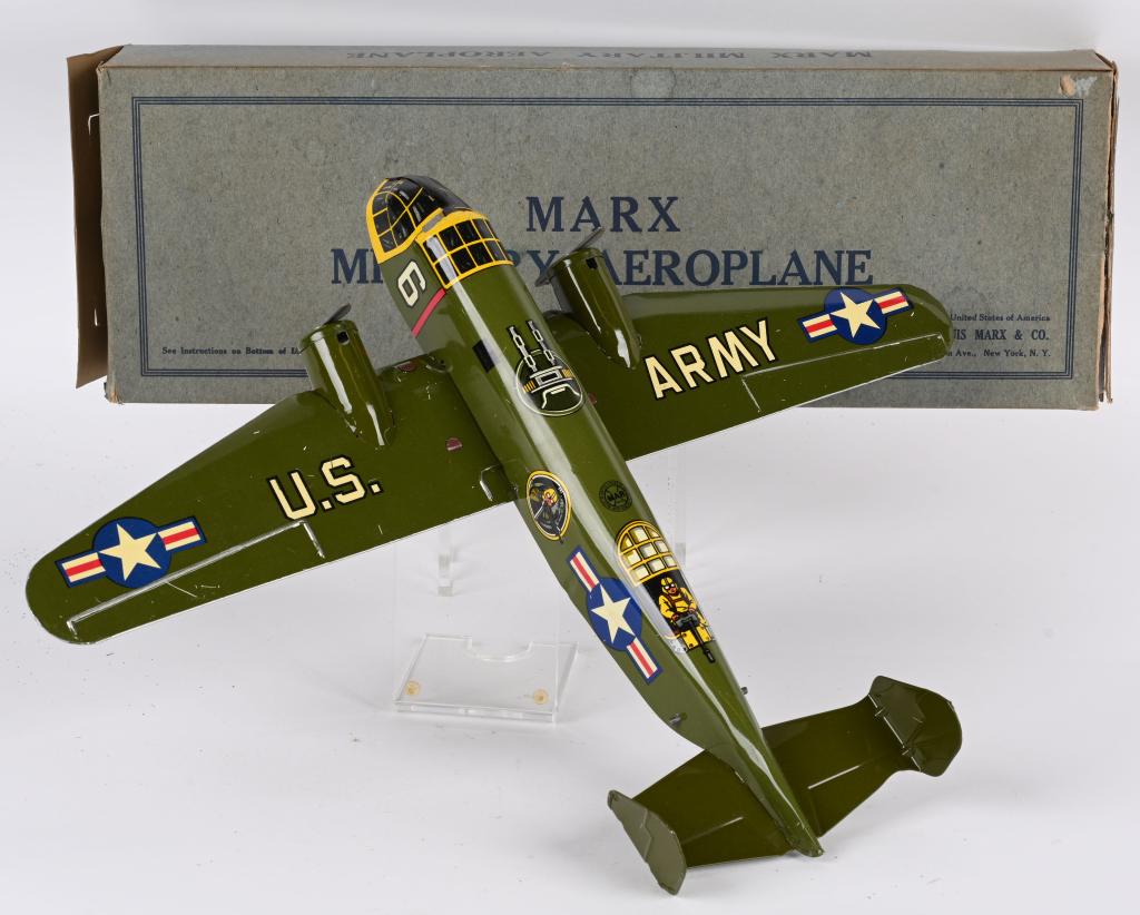 MARX TIN WINDUP MILITARY AIRPLANE w/ BOX: Marx tin windup Military Airplane. All original and looks basically never played with condition. Windup works. Boxed 18" Excellent