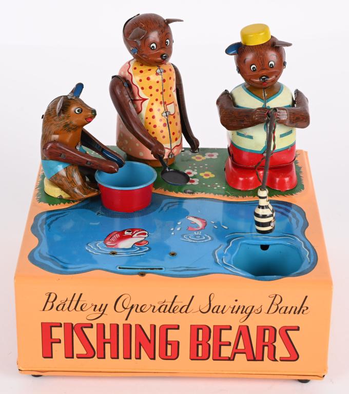 JAPAN BATTERY OP FISHING BEAR BANK: Japan battery operated Fishing Bears Savings Bank. All original and complete. Comes with accessory fish. Toy has great colors and shone. Battery box is clean. Worked when tested. 7" Excellent