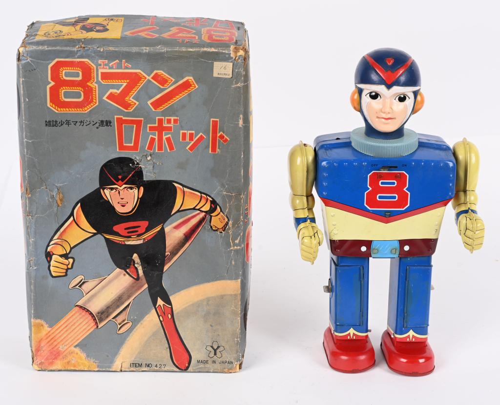 YONEZAWA BATTERY OP 8 MAN WALKING ROBOT w/ BOX: RARE Japan battery operated 8 Man Walking Robot. All original with great colors. Battery boxes are clean. Worked when tested. A very rare toy! With Box and Insert. 13" Excellent