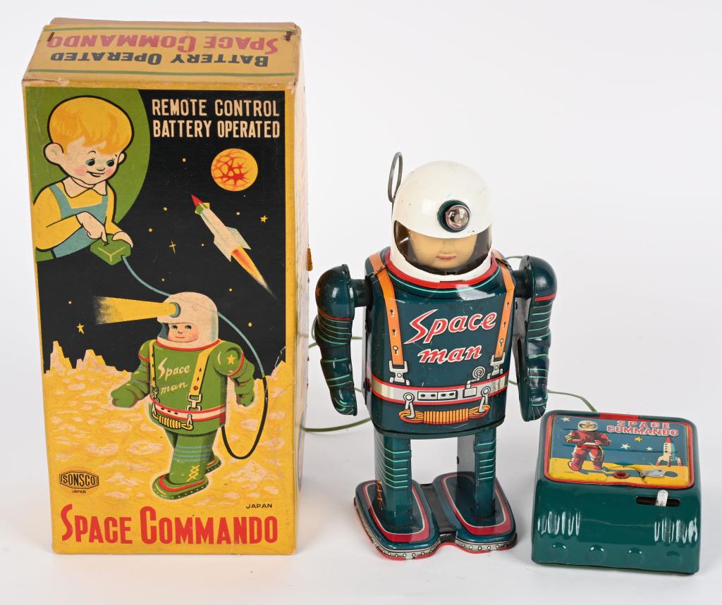 SONSCO BATTERY OP SPACE COMMANDO w/ BOX: Japan battery operated Space Commando. All original great looking Spaceman. Toy has nice colors. Comes with clean original Battery Box Remote with nice graphics. Worked when tested. Toy has a few ligh