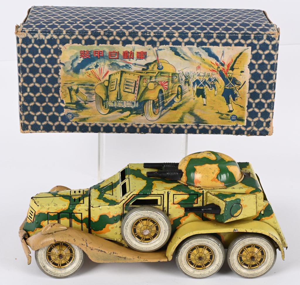 PREWAR JAPAN CLOCKWORK ARMORED CAR w/ BOX: RARE Prewar Japan tin clockwork Armored Car. All original with great camo finish. Large and impressive. Windup works. Has some normal wear. Comes with great Box and Key. 13 1/2" Very Good-Excellent