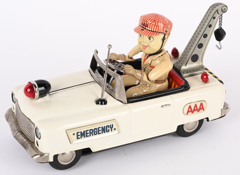 JAPAN BATTERY OP AAA TOW TRUCK: Japan battery operated AAA Tow Truck. All original and nice shape. Worked when tested. 9" Excellent