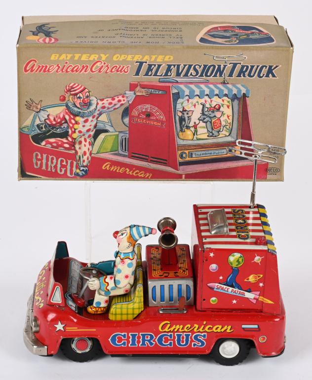 JAPAN BATTERY OP AMERICAN CIRCUS TELEVISION TRUCK: Japan battery operated American Circus Television Truck. All original and worked when tested. With reproduction Box. 10" Excellent
