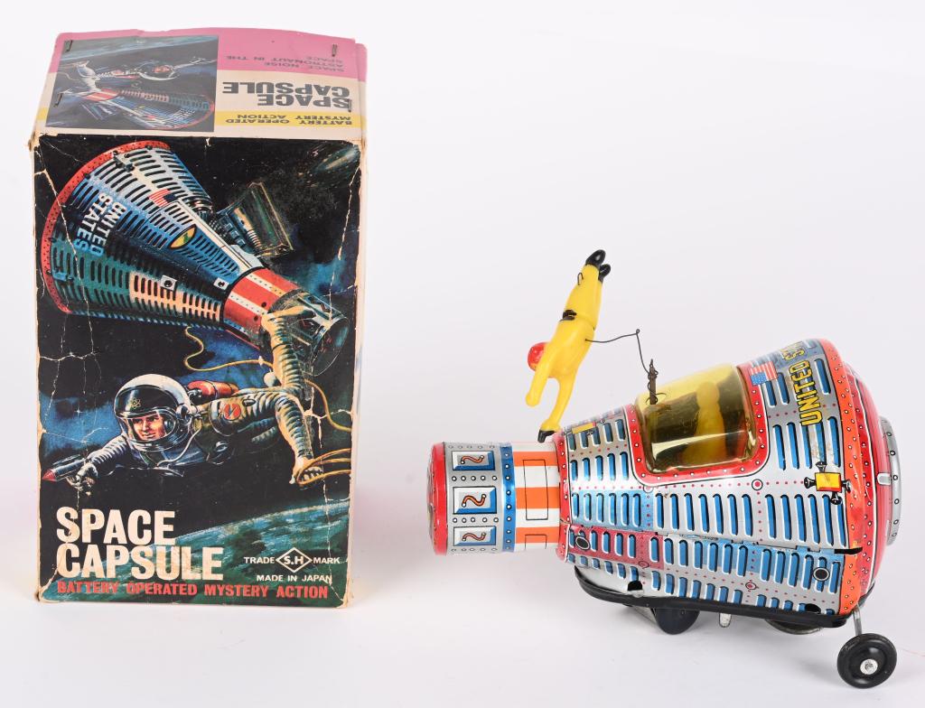 SH BATTERY OP SPACE CAPSULE w/ BOX: Japan battery operated Space Capsule with Mystery Action. All original and complete with Astronaut on Space Walk. Toy has great colors. Looks basically never played with. Did not operate when tested. 
