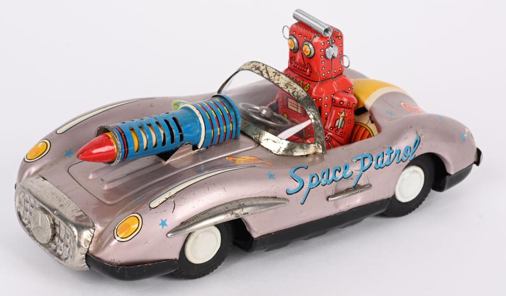 ATC TIN FRICTION SPACE PATROL ROBOT MERCEDES BENZ: ATC Tin Friction Space Patrol Robot Mercedes Benz. Scarce version with Gun on Hood. All original and complete. Friction works. 8" Excellent