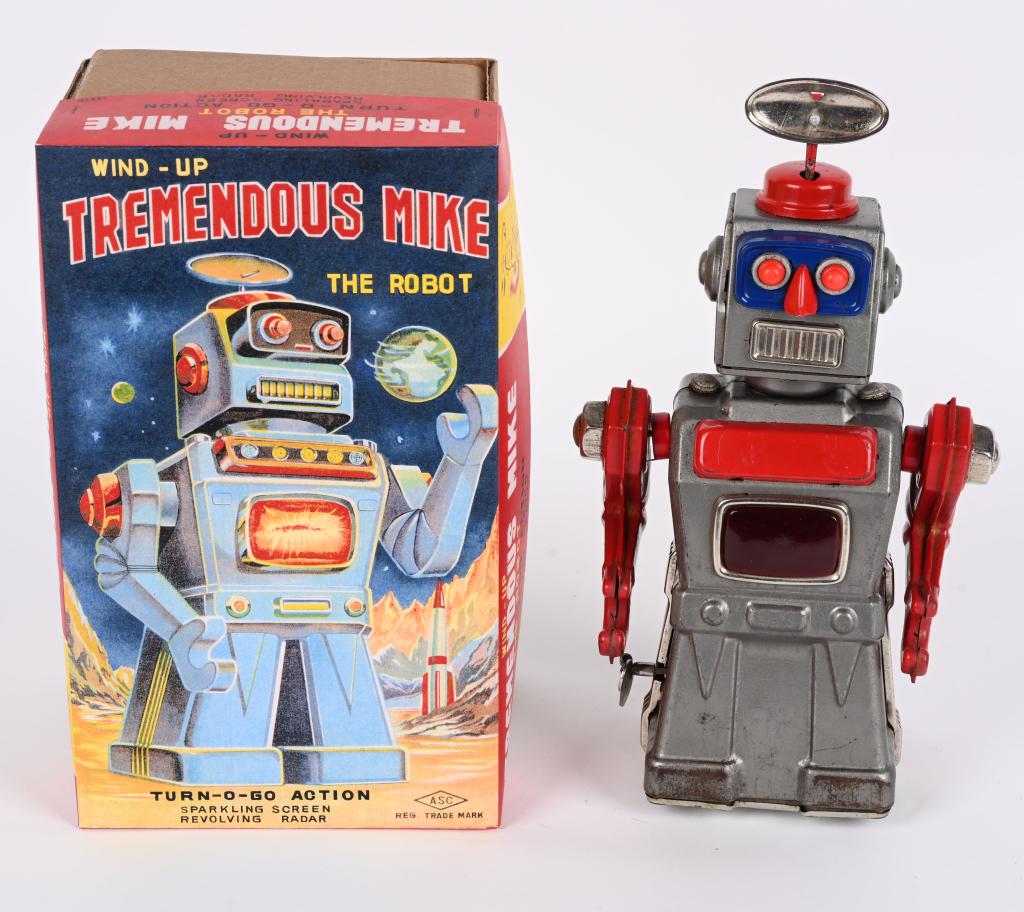 AOSHIN TIN WINDUP TREMENDOUS MIKE ROBOT: RARE Japan tin windup Tremendous Mike Robot. All original and complete with Antenna. Toy has some crazing and wear. Windup works. Still displays well. Hard to find Robot in any condition. With reprodu
