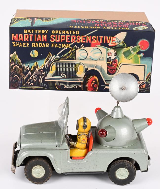 DAYIA BATTERY OP MARTIAN SUPER SPACE RADAR PATROL: Dayia battery operated Martian Supersensitive Space Radar Patrol. Made in Japan. All original and complete including the antenna. The toy has some crazing to the litho. Battery box is clean with some 