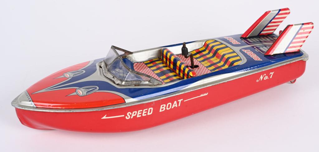 JAPAN TIN WINDUP ROBOT SPEED BOAT: Japan tin windup Robot Speed Boat. All original and works. 13 1/2" Excellent