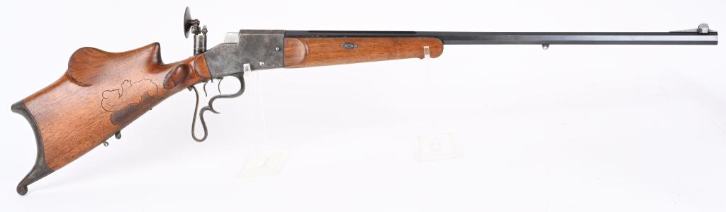 PAUL HEISE CHEMNITZ SCHUETZEN RIFLE - 8.15X46R: SERIAL 77. BARREL 31.5. CALIBER 8.15 X 46R. Full ribbed blue barrel with maker legend. Frame stamped original -system - aydt. Large falling block action, case colored with full octagon blued barrel, s