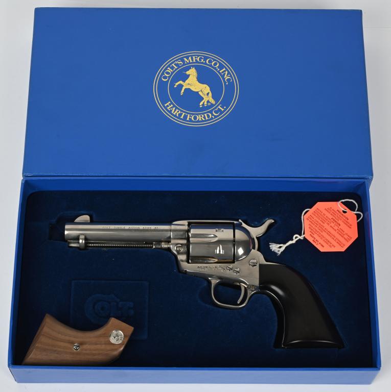 COLT CUSTOM SHOP NICKEL SAA -CONS. NUMBERS: SERIAL SA96279. BARREL 4 3/4". CALIBER .45 COLT. This gun as well as lot 618 are a matching pair with consecutive serial numbers, both as new unfired in their boxes, the outer boxes, hang tags and pap