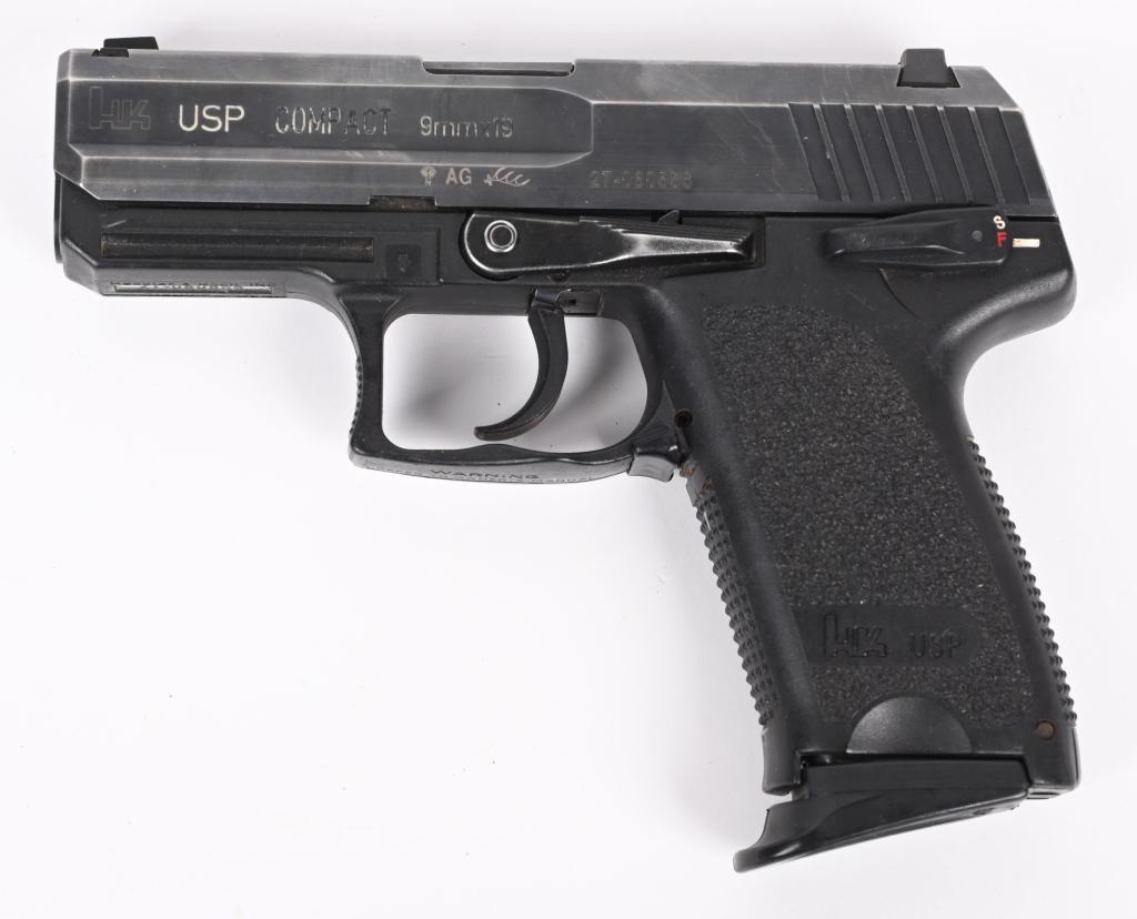 HECKLER & KOCH H&K USP COMPACT SEMI AUTO PISTOL: SERIAL NUMBER: 27-080556. BARREL: 3-1/2". CALIBER: 9MM LUGER. MANUFACTURED: 2006. Made in Germany. Manual safety model, also acting as a de-cocker. Factory 3-dot sights, blued slide and black polymer 