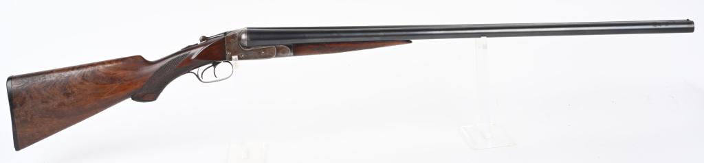ITHACA SXS HAMMERLESS SHOTGUN: SERIAL 81650. BARRELS 30". GAUGE 12. CHAMBER 2 3/4". CHOKE FULL & FULL. LOP 14". CRASS GRADE MADE 1903. Features lightly engraved box lock action, double triggers, checkered pistol grip walnut stock w