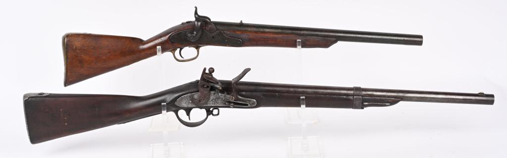 PAIR 1822 US & 1853 ENFIELD CUT DOWN MUSKETS: Old rifle often found shortened and used by the Confederates as well as Plains Indians. The Enfield lock is dated 1853 with Tower stamp and has a 19.5" barrel. The 1822 flintlock has US eagle stamp on