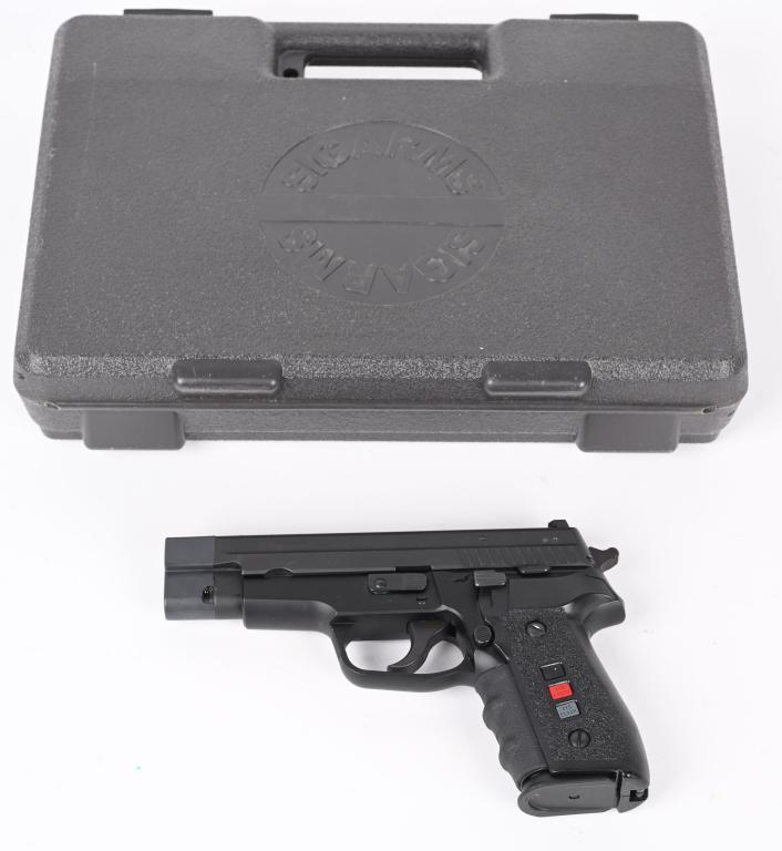 SIG SAUER P229 SEMI AUTO PISTOL WITH CASE: SERIAL NUMBER: AF19804. BARREL: 4". CALIBER: .40 S&W. MANUFACTURED: 1990s. Frame made in Germany, with the rest of the parts made in New Hampshire. Trijicon H3 sights. Matte finished slide and frame. 