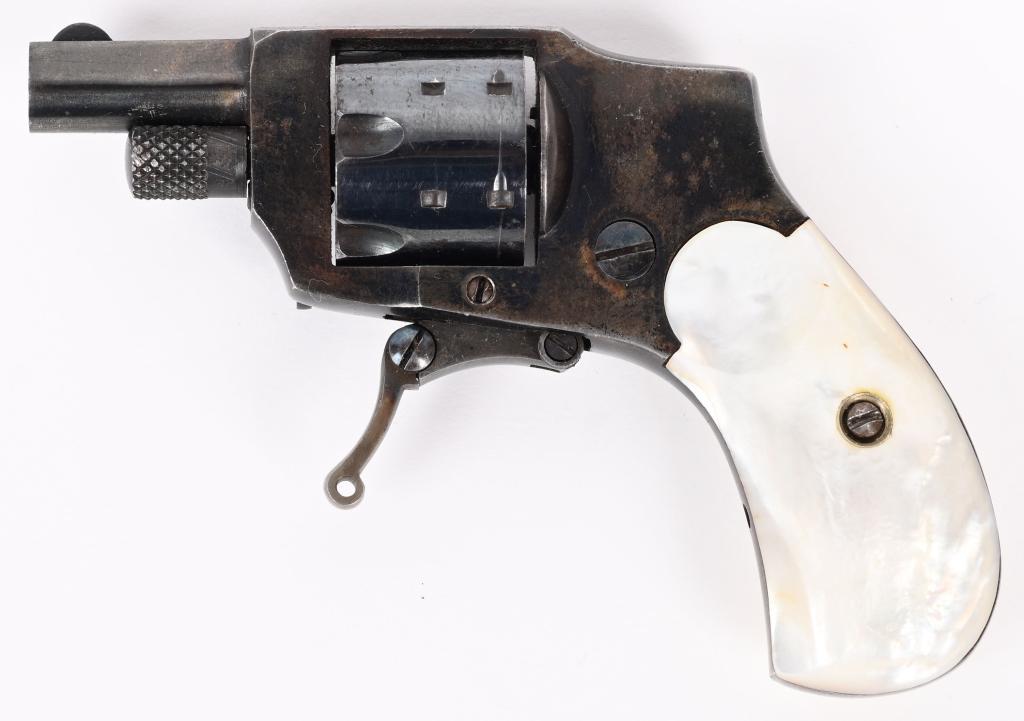 KOLB BABY HAMMERLESS REVOLVER W / PEARLS: NSN. BARREL 1 1/4". CALIBER .22 This Small Frame First Model , patent in 1910, came in .22 Short.. Frame is stamped patent pending with BABY HAMMERLESS and some dates above which are no longer readabl