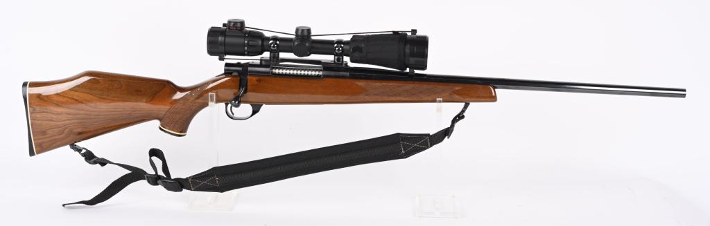 SMITH & WESSON MODEL 1500 BOLT ACTION RIFLE: SERIAL NUMBER: PN21079. BARREL: 22". CALIBER: .270 WIN. MANUFACTURED: 1980S. Made in Japan by Howa for Smith & Wesson. Standard weight barrel. Hinged floor plate. Original blued finish and deluxe styl