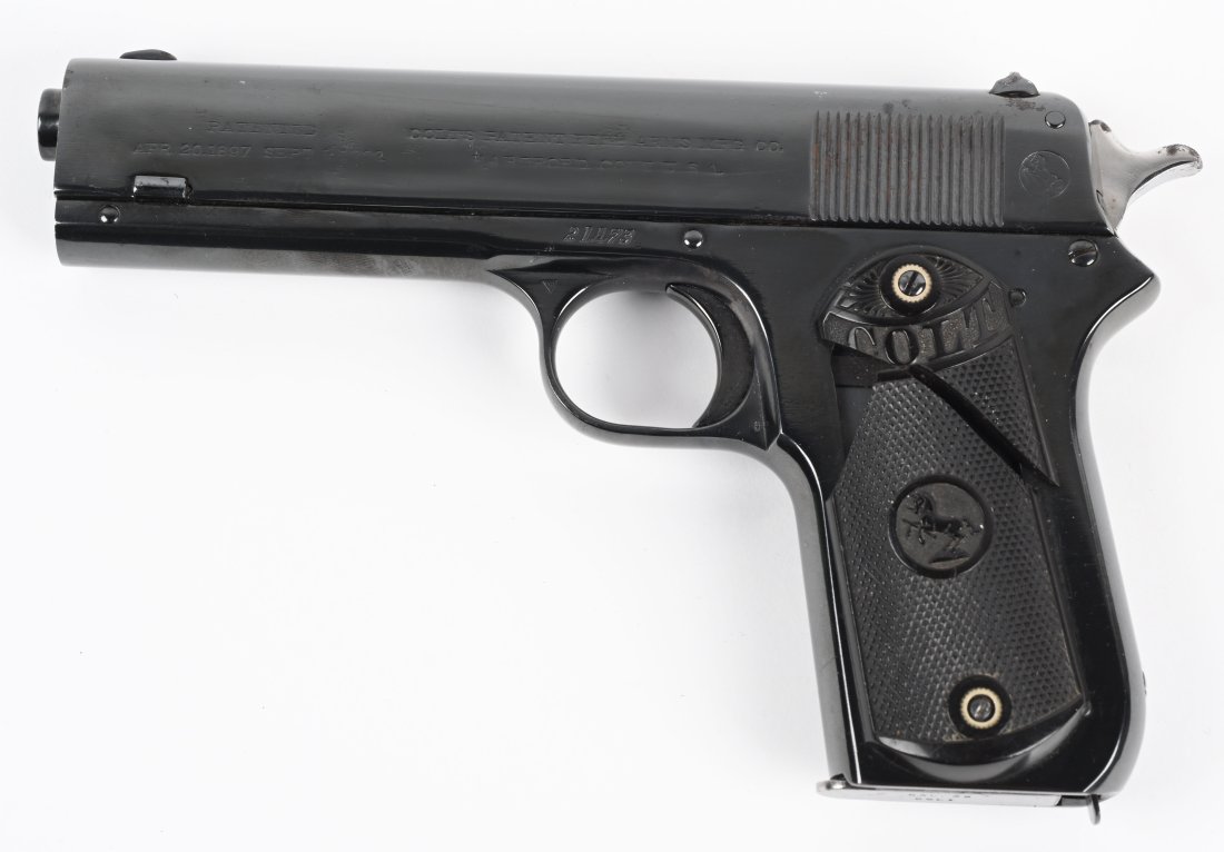COLT MODEL 1903 SPUR HAMMER .38 AUTOMATIC: SERIAL NUMBER 21473 BARREL 4 1/2" CALIBER .38 AUTO MANUFACTURED 1908. A continuation of the Model 1902 in a more compact variation with shorter barrel. Blue finish with 2 piece checkered hard plastic