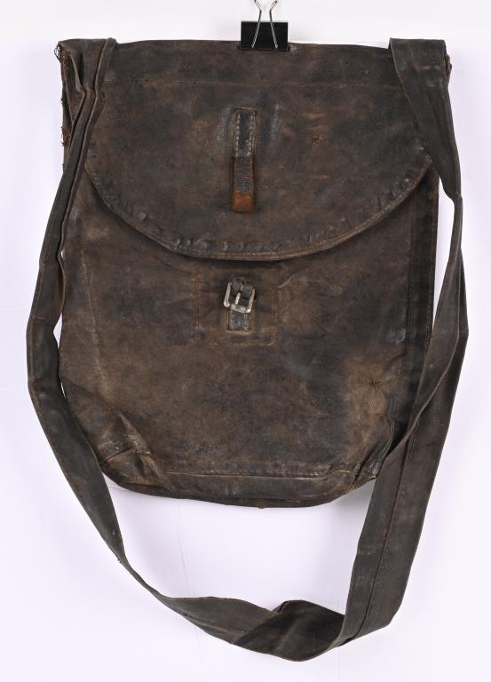 US CIVIL WAR UNION FEDERAL HAVERSACK: Pattern 1851 haversack constructed of tarred canvas or linen body in six sections; leather fastening strap (partially present) with steel roller buckle; and tarred canvas strap. This haversack wa