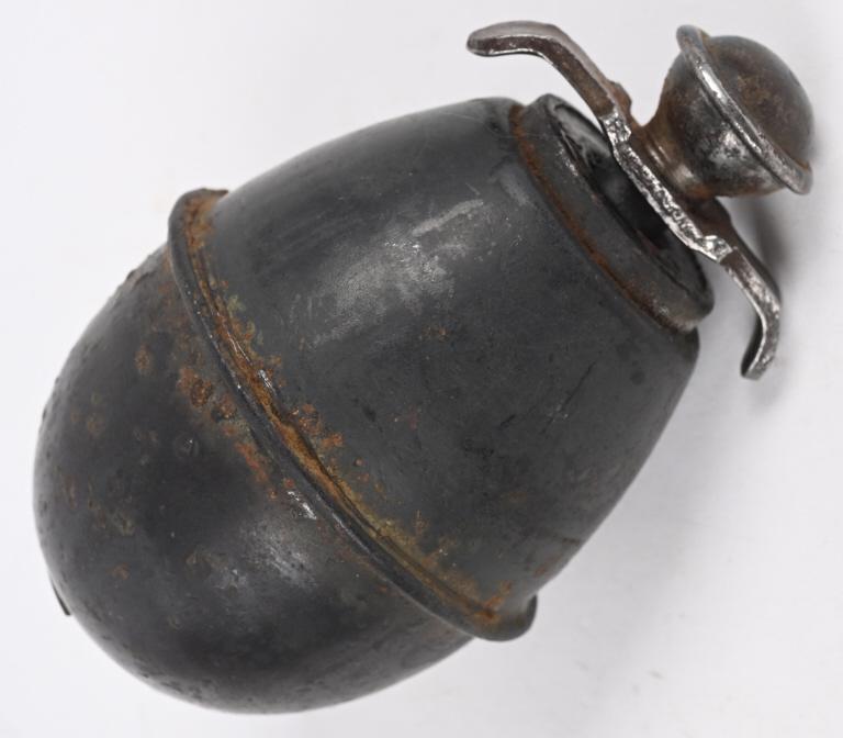 WWII NAZI GERMAN M39 EGG GRENADE BY EVY 44 WW2: Later pattern, (Circa 1942-1945) two piece, vertically oval, tooled and stamped, magnetic sheet metal construction, high explosive concussion, egg grenade with a raised, central, brazed, horizontal ri