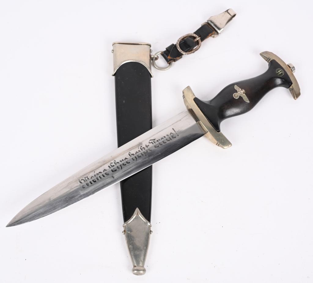 WWII NAZI GERMAN SS M33 SERVICE DAGGER M324/38: This RZM 324/38 SS Dagger is a very rare and desirable dagger, of a type that is highly prized among the collecting community. The blade is etched with “Meine Ehre heißt Treue!” with 