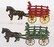 2- CAST IRON HORSE DRAWN STAKE WAGONS