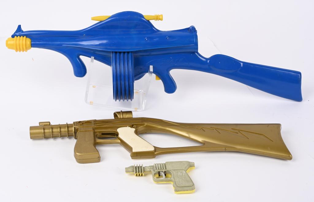 3- VINTAGE SPACE GUNS: 3 Plastic Space Guns. Both all original Blue gun has broken site and Gold is missing trigger. Both display very well. Largest 24" Excellent