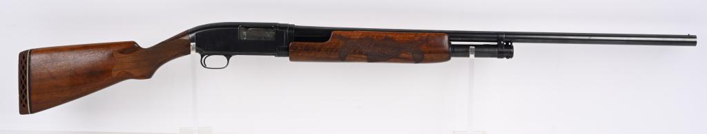 CUSTOM WINCHESTER MODEL 12 PUMP SHOTGUN: SERIAL 533714. BARREL 30". GAUGE 12. CHOKE FULL. CHAMBER 2 3/4". LOP 14" MADE 1927. Custom oil finish, hand checkered pistol grip stock with carved pheasant on left side, blue finish, plain barrel, ni
