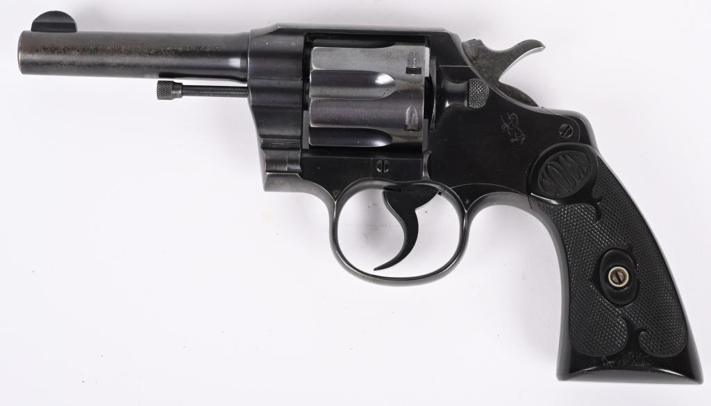 PRE WAR COLT ARMY SPECIAL 32-20 REVOLVER: SERIAL 469262. BARREL 4". CALIBER 32-20. MADE IN 1922. Features blue finish, fix sight, double action, Colt monogram gutta percha grips with fire blue on back of hammer and trigger. Condition. Left si