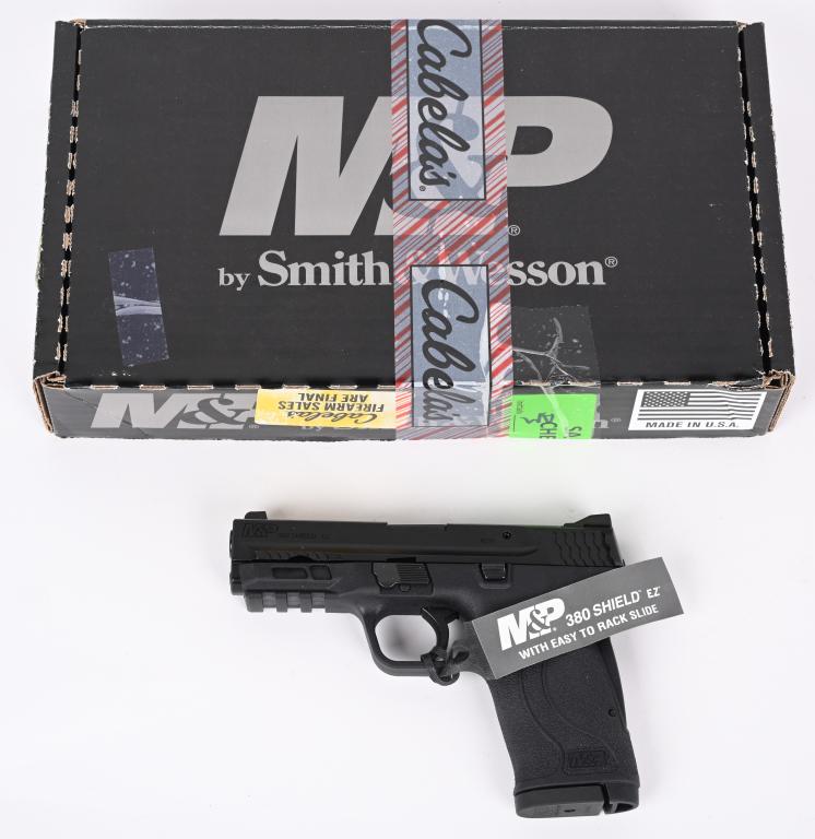 SMITH & WESSON M&P M2.0.380 SHIELD EZ SEMI AUTO: SERIAL NUMBER: RCT0894. BARREL: 3-3/4". CALIBER: .380 AUTO. MANUFACTURED: 2010S. Standard markings and features. Factory 3-dot sights. Matte black slide and polymer frame. Includes two factory eight r