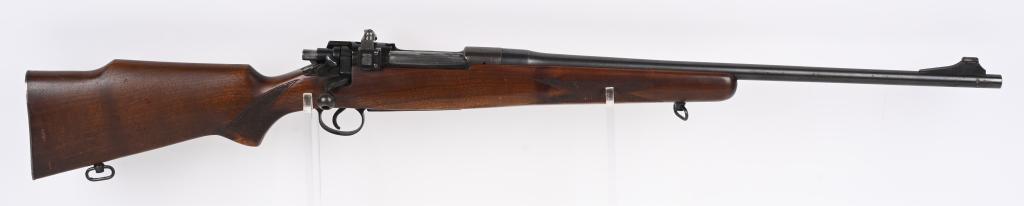 US WINCHESTER MODEL 1917 CUSTOM SPORTER: SERIAL 394464. BARREL 23". CALIBER 30-06. Original frame and shortened barrel with added ramp front sight, no rear barrel sight, receiver peep sight, custom walnut stock with checkered pistol grip, Mo