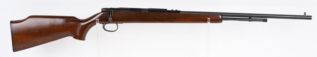 REMINGTON MODEL 592M BOLT ACTION 5MM RIFLE: SERIAL 1094149. BARREL 24". CALIBER 5MM. Features hardwood stock with pistol grip and Monte Carlo comb. Blue finish with tube magazine. Rear sight removed. Grooved for scope. Only made from 1970-73. C