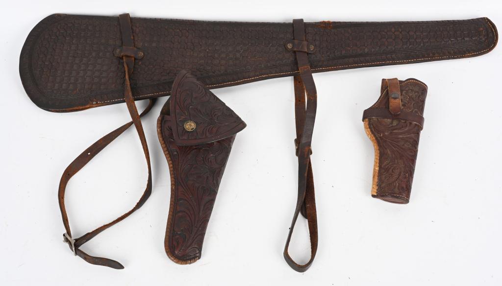 LOT (3) VINTAGE HEISER HOLSTERS SCABBARD: A. Made for Colt full size 1911.. Fully tooled with snap. B. Large flap holster for a Colt 7 1/2" SAA, also fully tooled. C. Saddle scabbard for Winchester or Marlin carbine, Basket Weave design, Stra