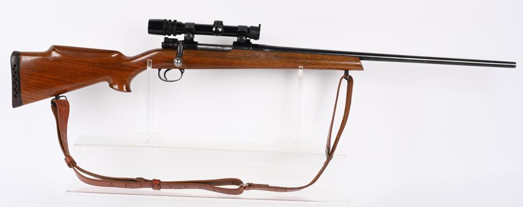CUSTOM ASSEMBLED MAUSER RIFLE CAL, 243 W/ SCOPE: SERIAL NUMBER 6158 BARREL 24 /2" CALIBER 243 WINCHESTER . MANUFACTURED CIRCA 1970'S. Large ring Mauser 98 action with Bueler safety , Timney trigger and unknown sporter weight 243 barrel. Varnished pi