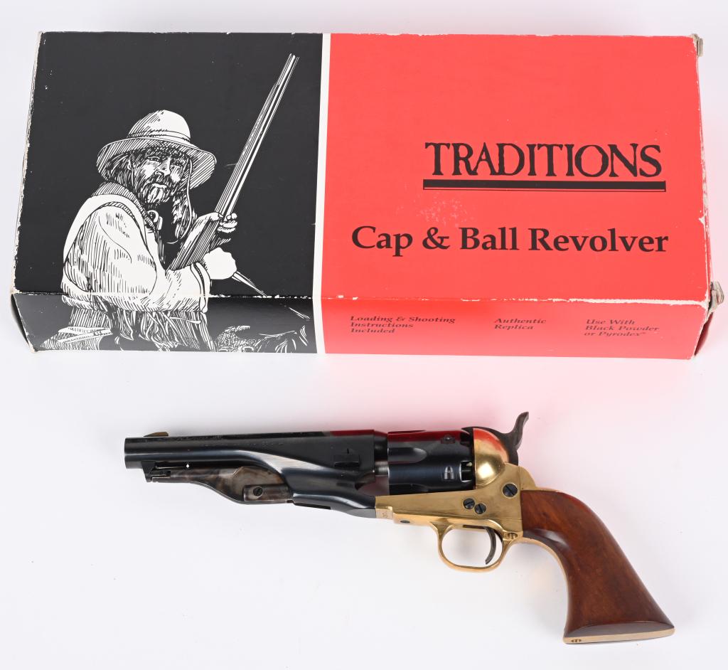 BOXED TRADITIONS SHERIFF 1861 NAVY REVOLVER: SERIAL 426742. BARREL 5.5". CALIBER .36. Features brass frame, 6-shot fluted cylinder, one piece walnut grips, case color lever & hammer, round barrel. Condition. Appears unfired with minor handling. 