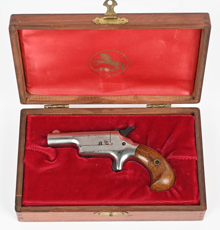 COLT THIRD MODEL .41 DERINGER: SERIAL 18668. BARREL 2.5". CALIBER .41 RF. 3RD MODEL THUER. Nickel finish with fire blue screws and bird head walnut grips, spur trigger, barrel swings out for loading. First made in 1875. Comes in mo
