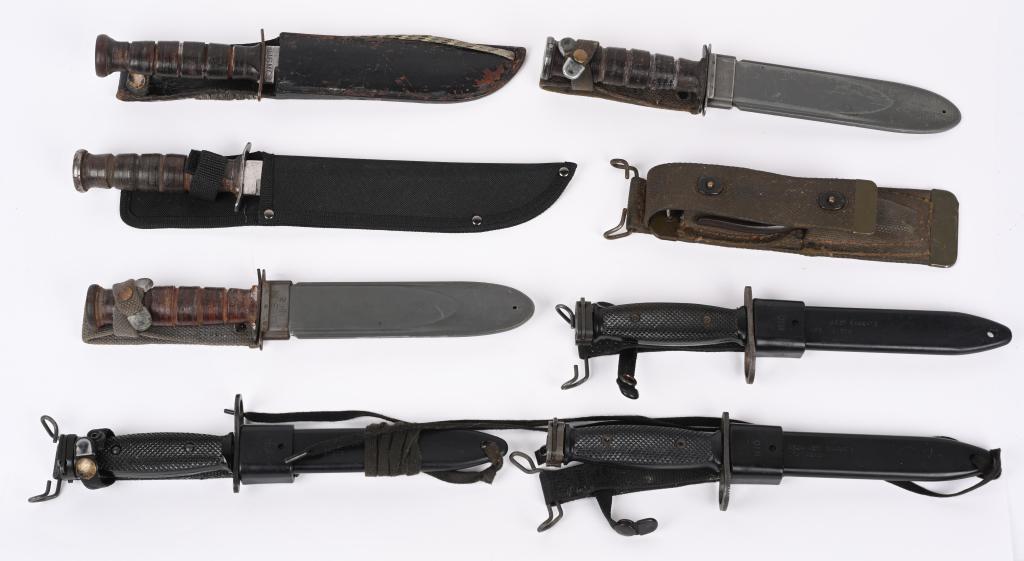 LOT OF U.S. MILITARY FIGHTING KNIVES AND BAYONETS: Lot contains: 3 M7 bayonets, all in M10 plastic scabbards. 2 Camillus U.S.N. Mark 2 fighting knives with proper scabbards. "USMC" marked KA-BAR 7" fixed blade knife with leather sheath. Camillus marke