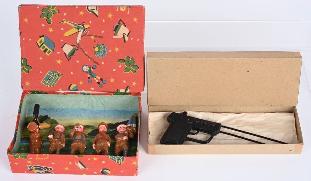 SOLDIERS & BULLS EYE GUN w/ BOXES: Set of composition Soldiers and cast iron Bulls Eye Gin. Both in great condition. Boxed 8 1/2" Excellent