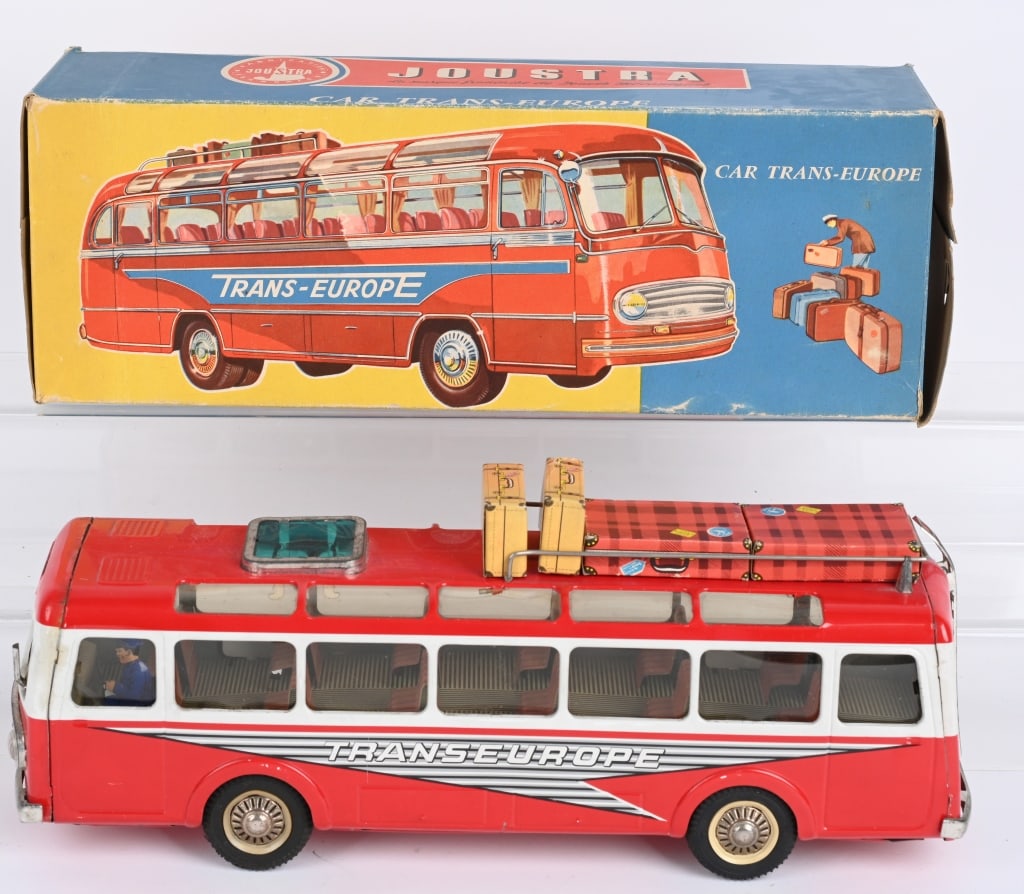 JOUSTRA TIN FRICTION TRANS-EUROPE BUS w/ BOX: All original and in great condition. Comes with 4 paper suitcases. Friction works. Boxed 16" Excellent