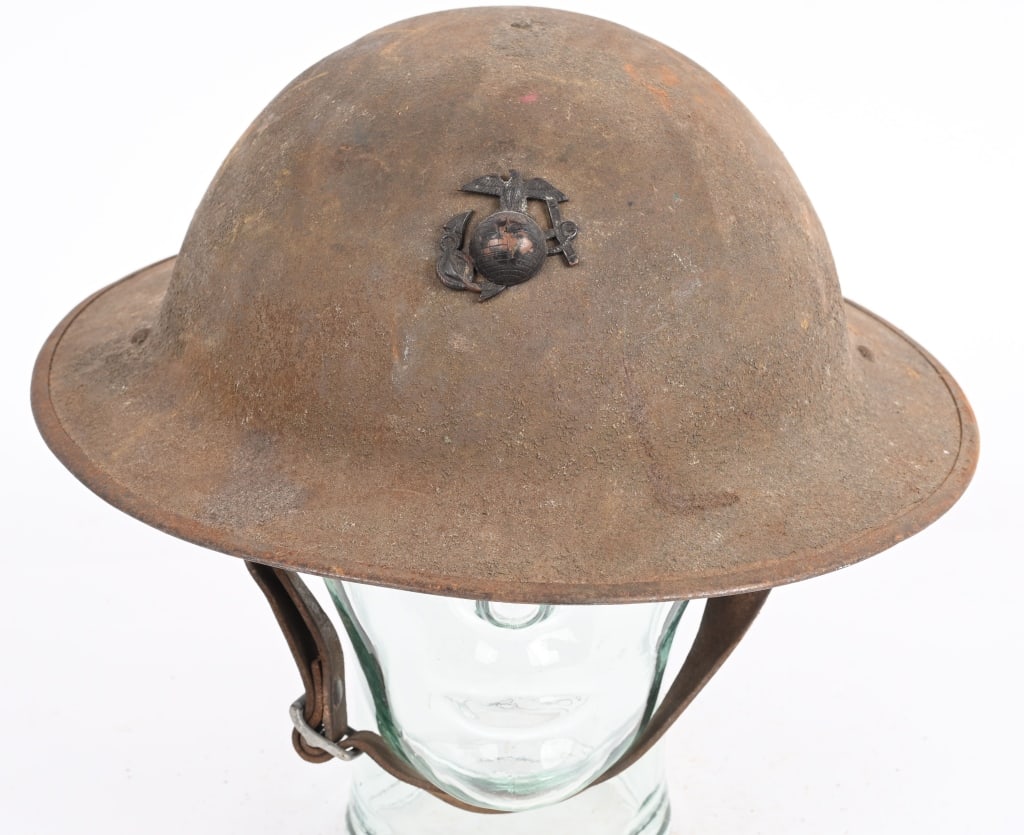 WWI US MARINE CORPS COMBAT HELMET USMC WW1: US made non-magnetic hardened manganese steel helmet. 1916 pattern is basin-shaped with a small rivet to the apex of the crown, fixing the internal liner, and two small rivets along the apron, one ove