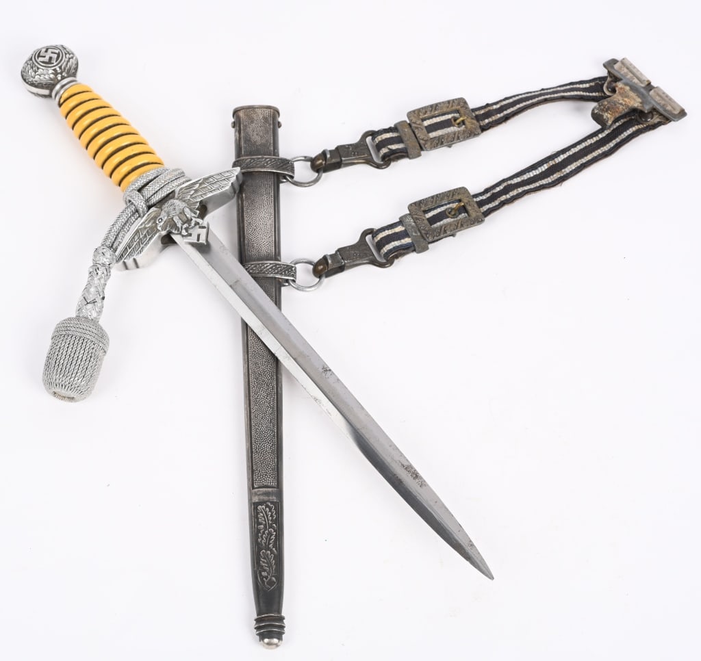 WWII NAZI GERMAN LUFTWAFFE DAGGER HANGERS WW2: Roughly, 29cm long, bright, nickel/silver plated, double edged, drop forged steel, stiletto style blade with a flat central plane. The leather washer is still intact. The dagger has a well defined, ni